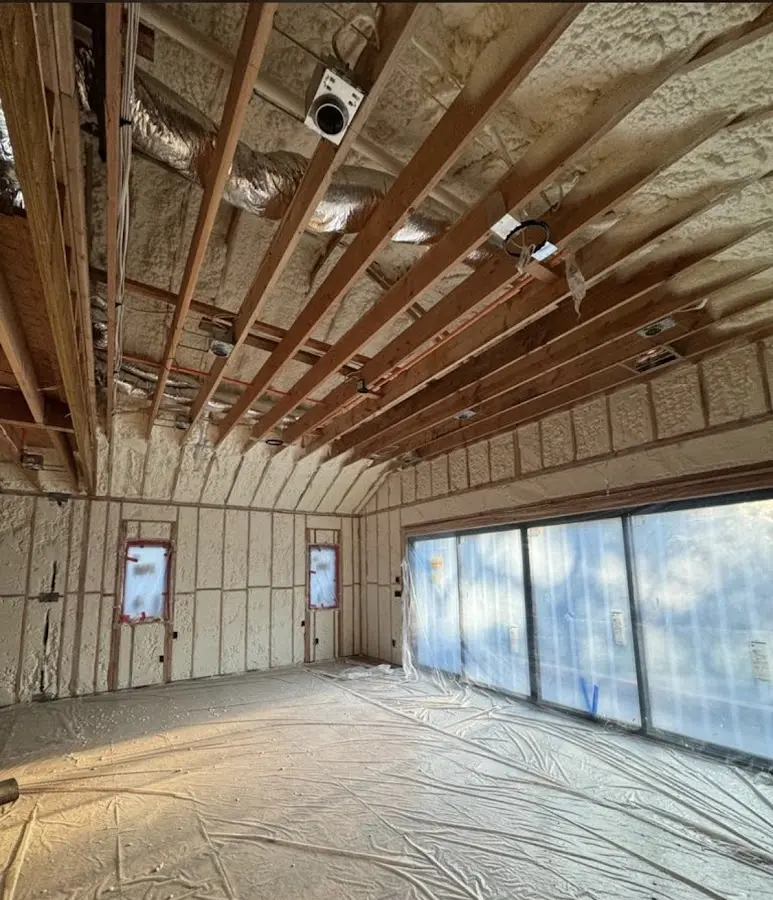 Interior walls and ceiling insulated with spray foam during new construction in Pensacola